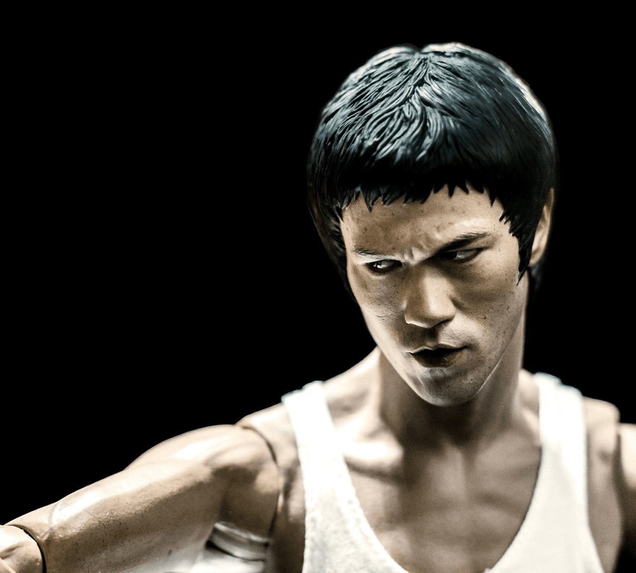 Bruce Lee action figure with black background