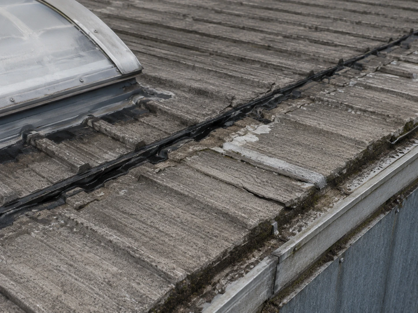 Roof inspection report visual combining an overview image and close-up defect photographs