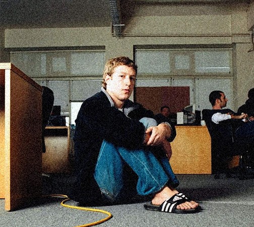 man in white dress shirt sitting beside woman in black long sleeve shirt