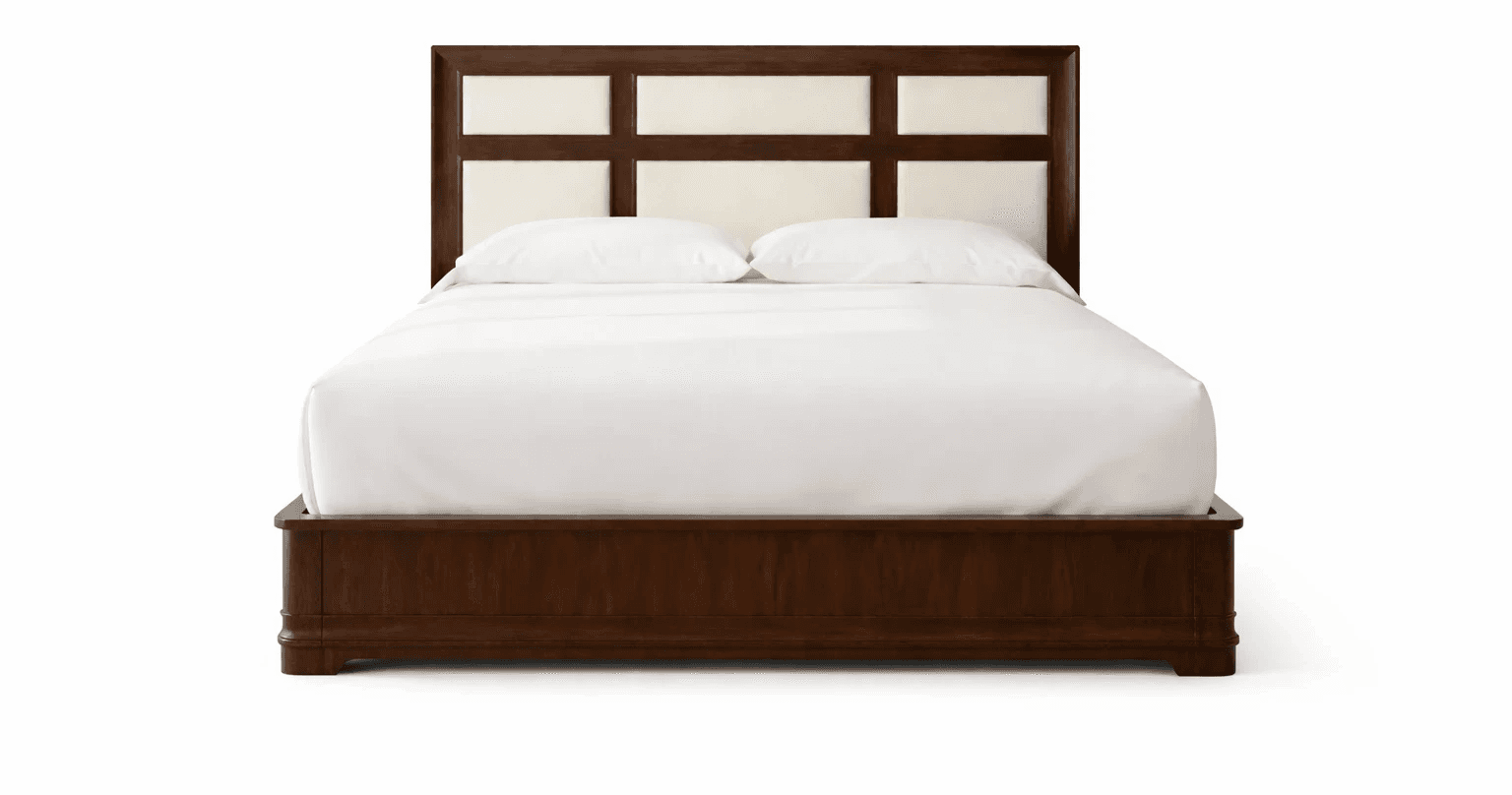 Wooden bed with grid‑style headboard panels and straight‑lined frame