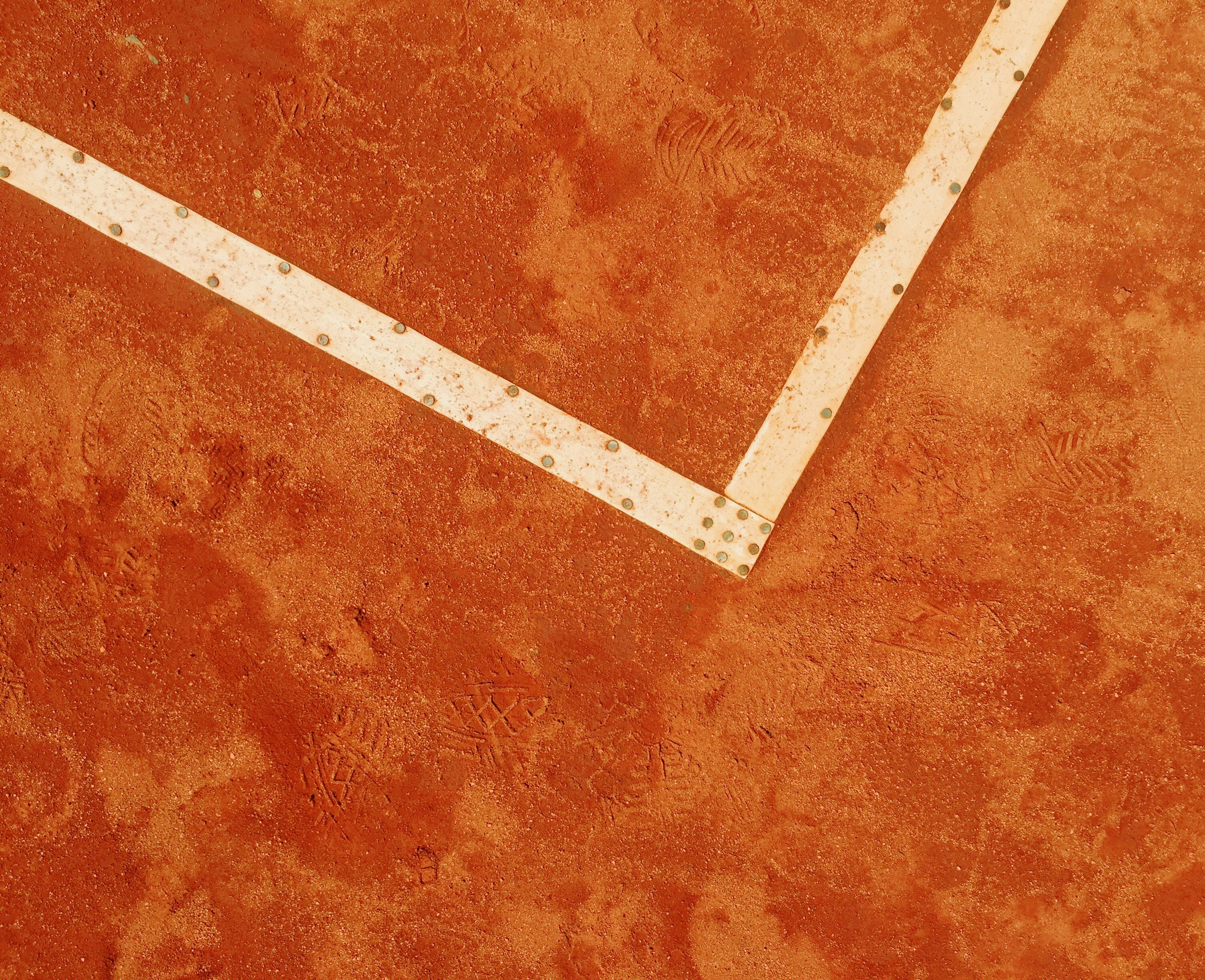 Edge of a clay tennis court