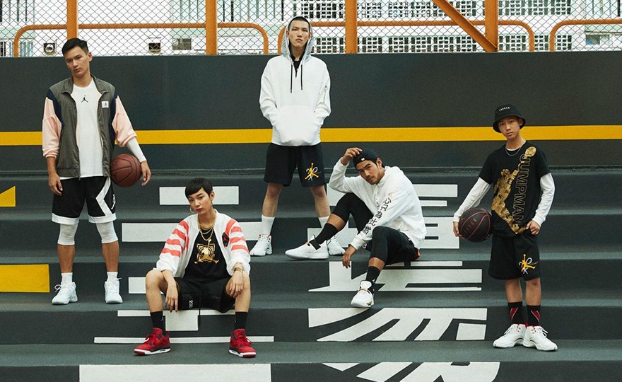 Some people standing and sitting in different posses.