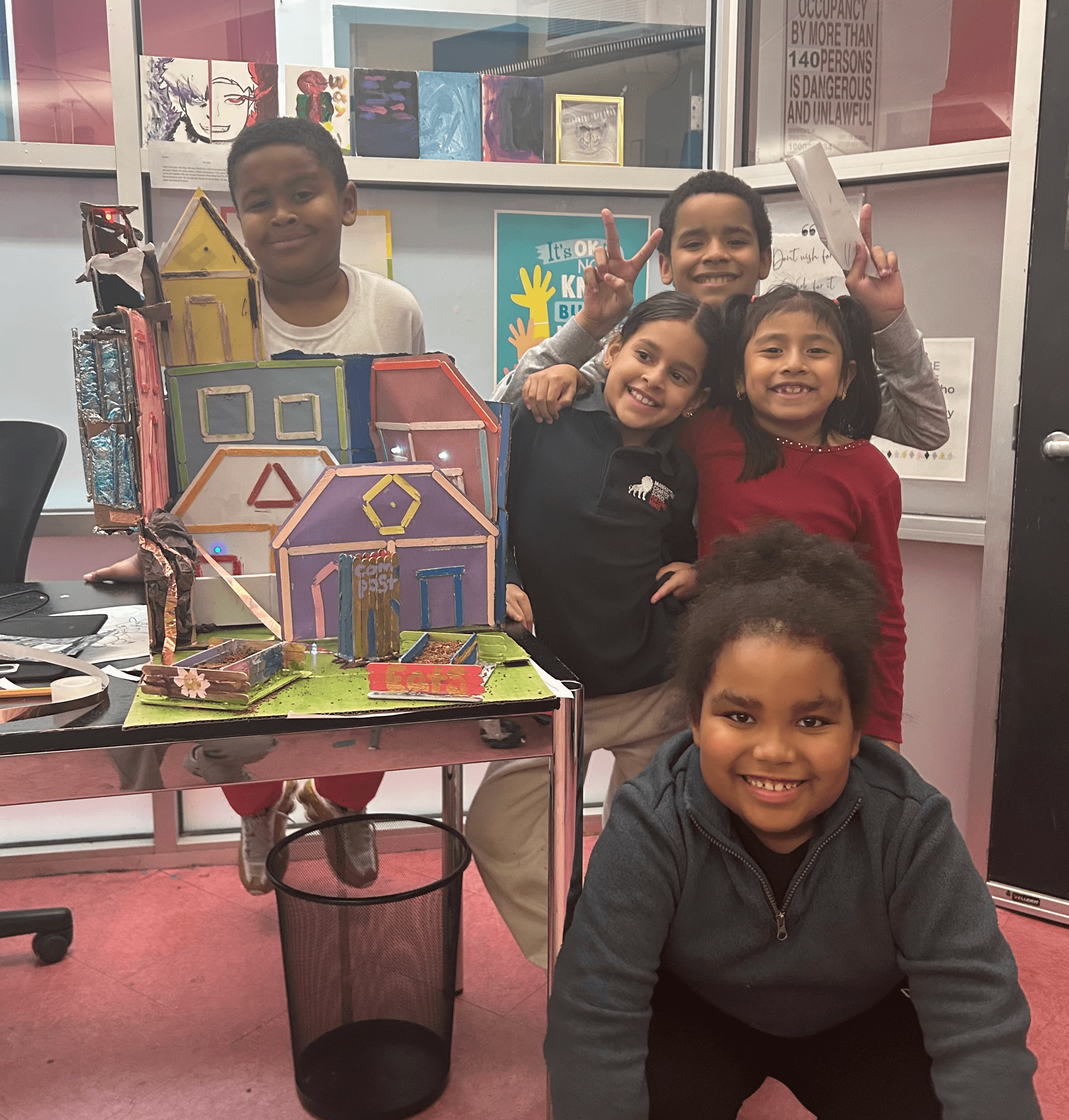Youth participants show off their display to participate in the Global Innovation Summit.
