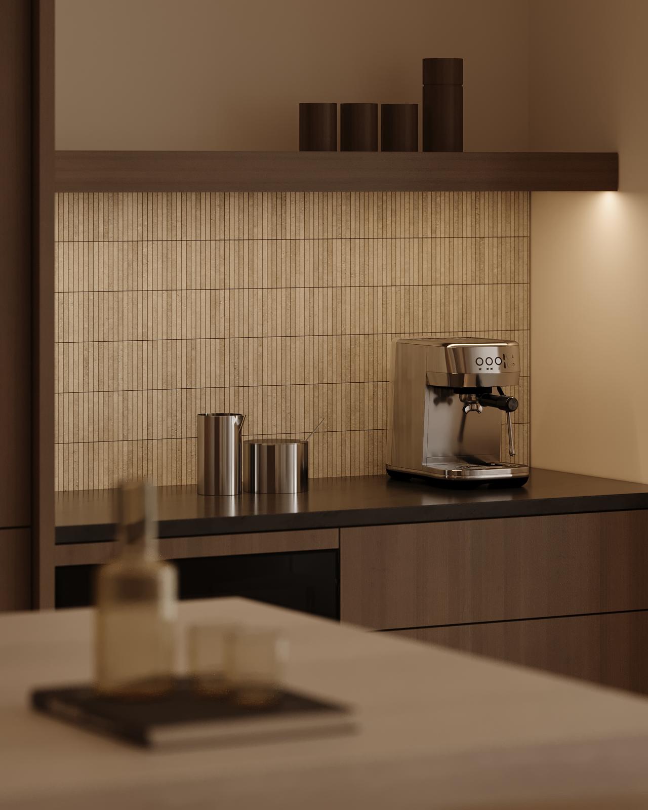 Modern kitchen counter with coffee maker, shelf, and decorative items against a tiled wall. Soft lighting creates a warm ambiance.