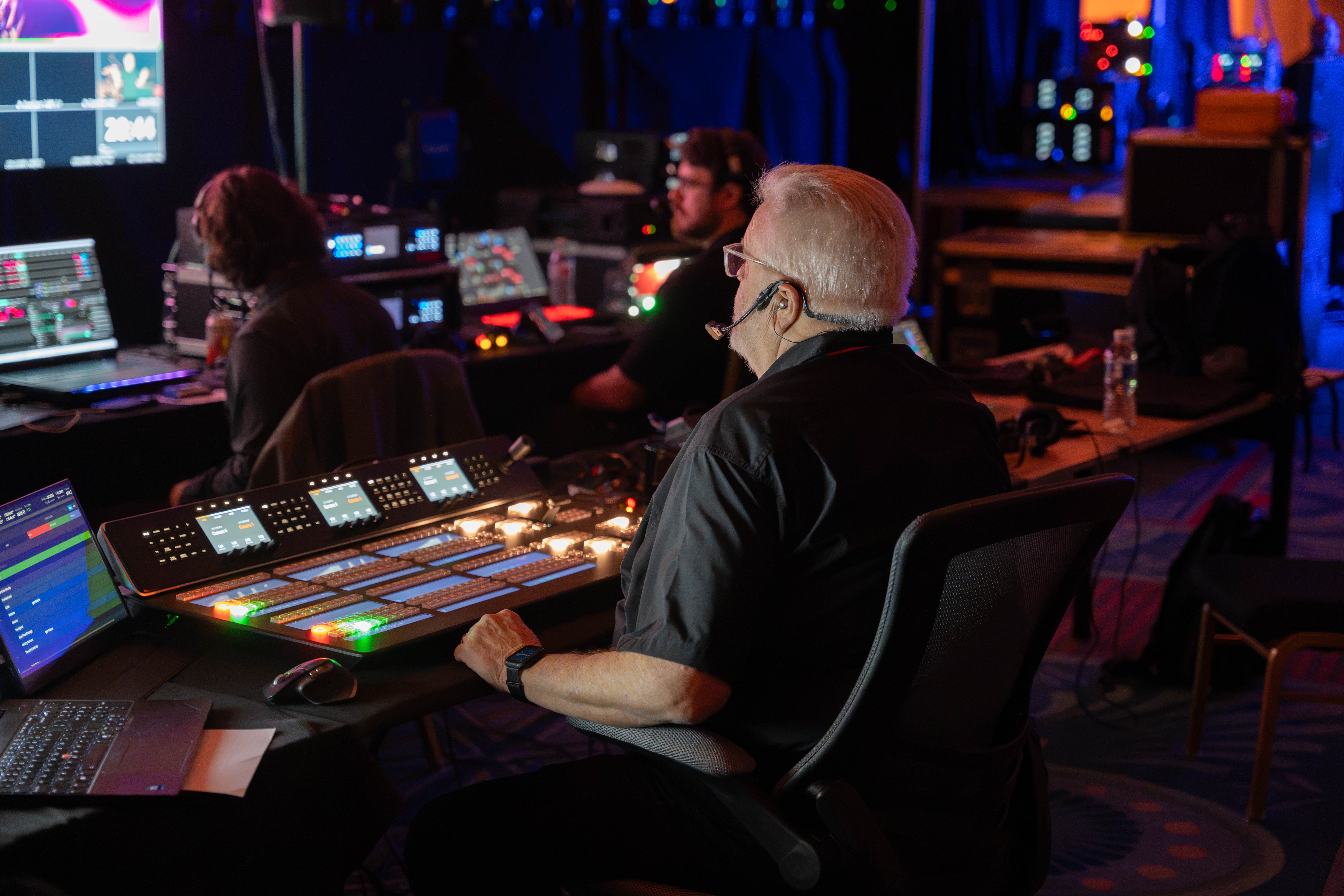 TRG technician running audio and video from a control console