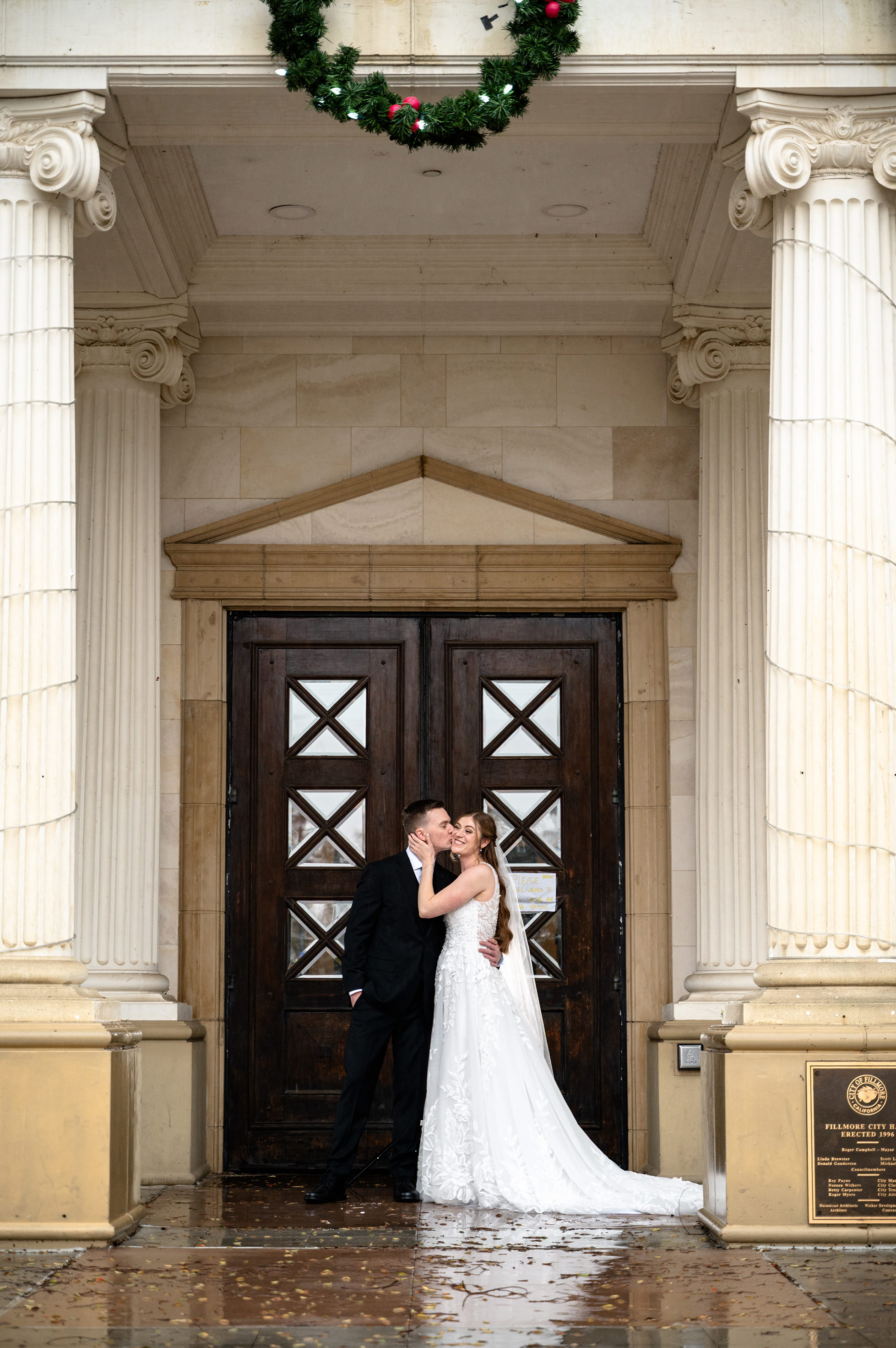 Flat lay wedding details with bouquet, rings, and sparkling bridal heels