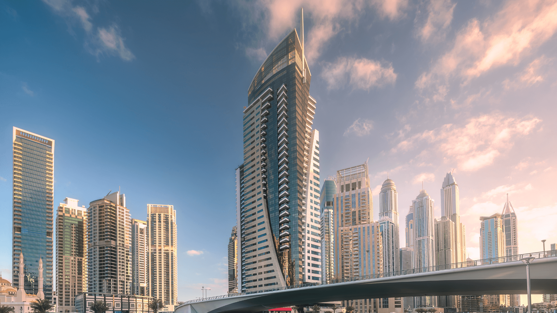 Modern Dubai skyline featuring luxury hotels and high-rise towers under clear blue sky | Lunasole Hospitality