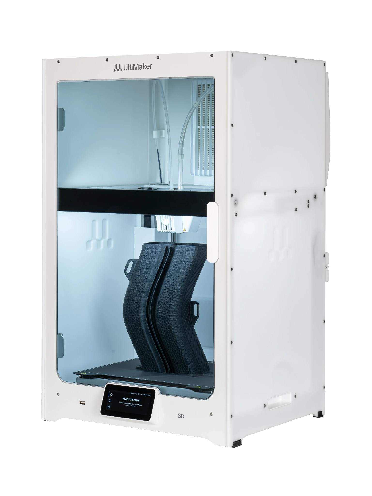 Modern home office setup with a monitor, ergonomic chair, keyboard, and indoor plants near a window with blinds.