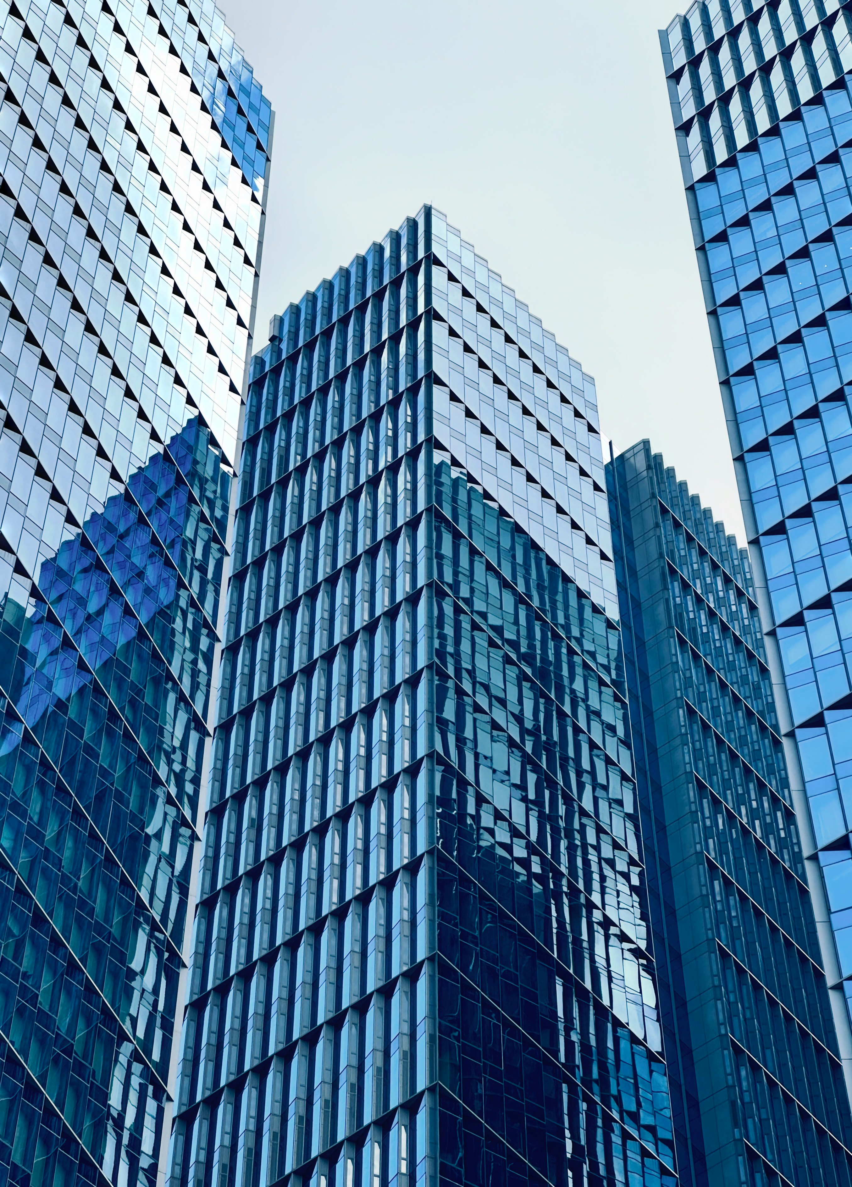 A group of skyscrapers that are next to each other