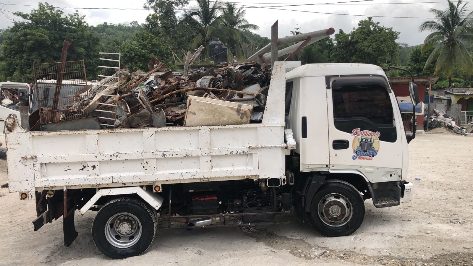this truck is used to carryout truck removal service