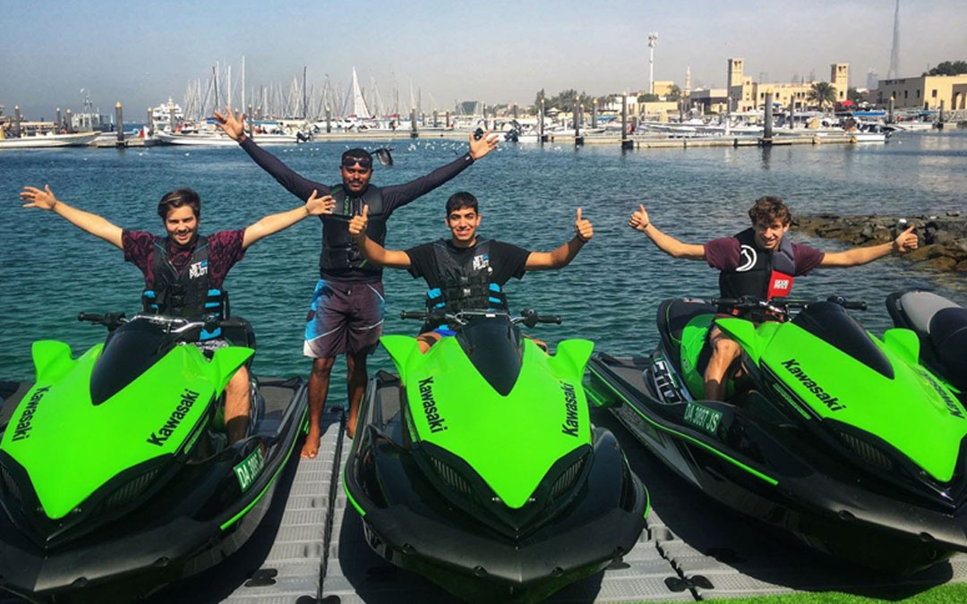 Group of friends enjoying jet skiing in Dubai as part of exciting water activities with friends, showcasing one of the top activities to do with friends in Dubai during summer