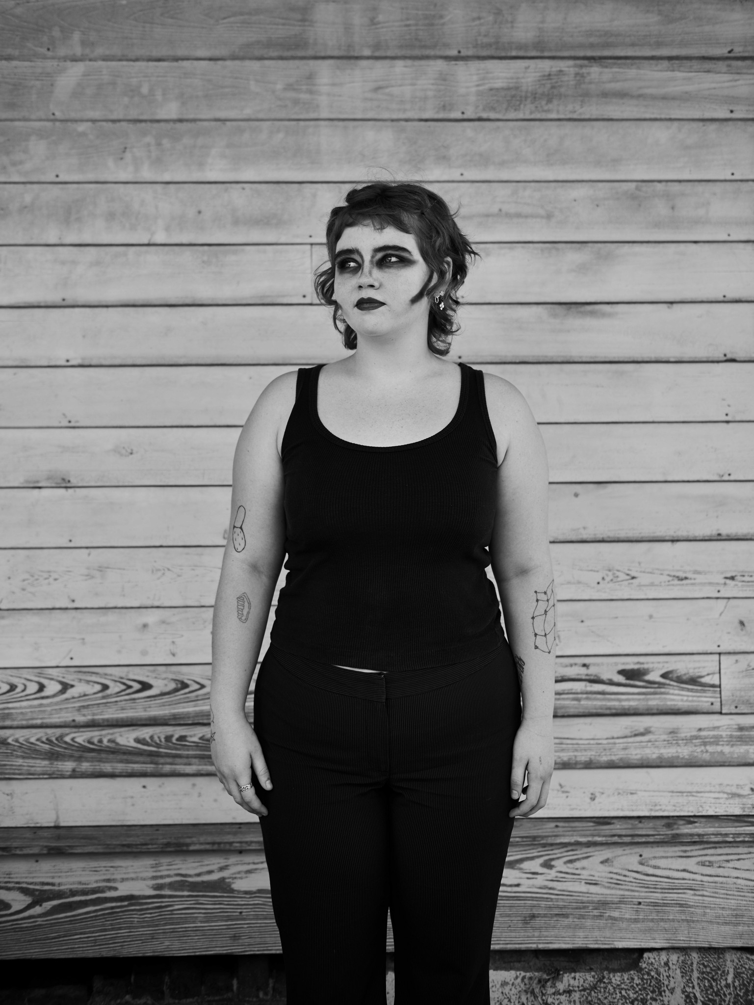 Black and white portraits of young alternative, romantic, goth, freak, punk and metal character against a textured New Orleans backdrop. 