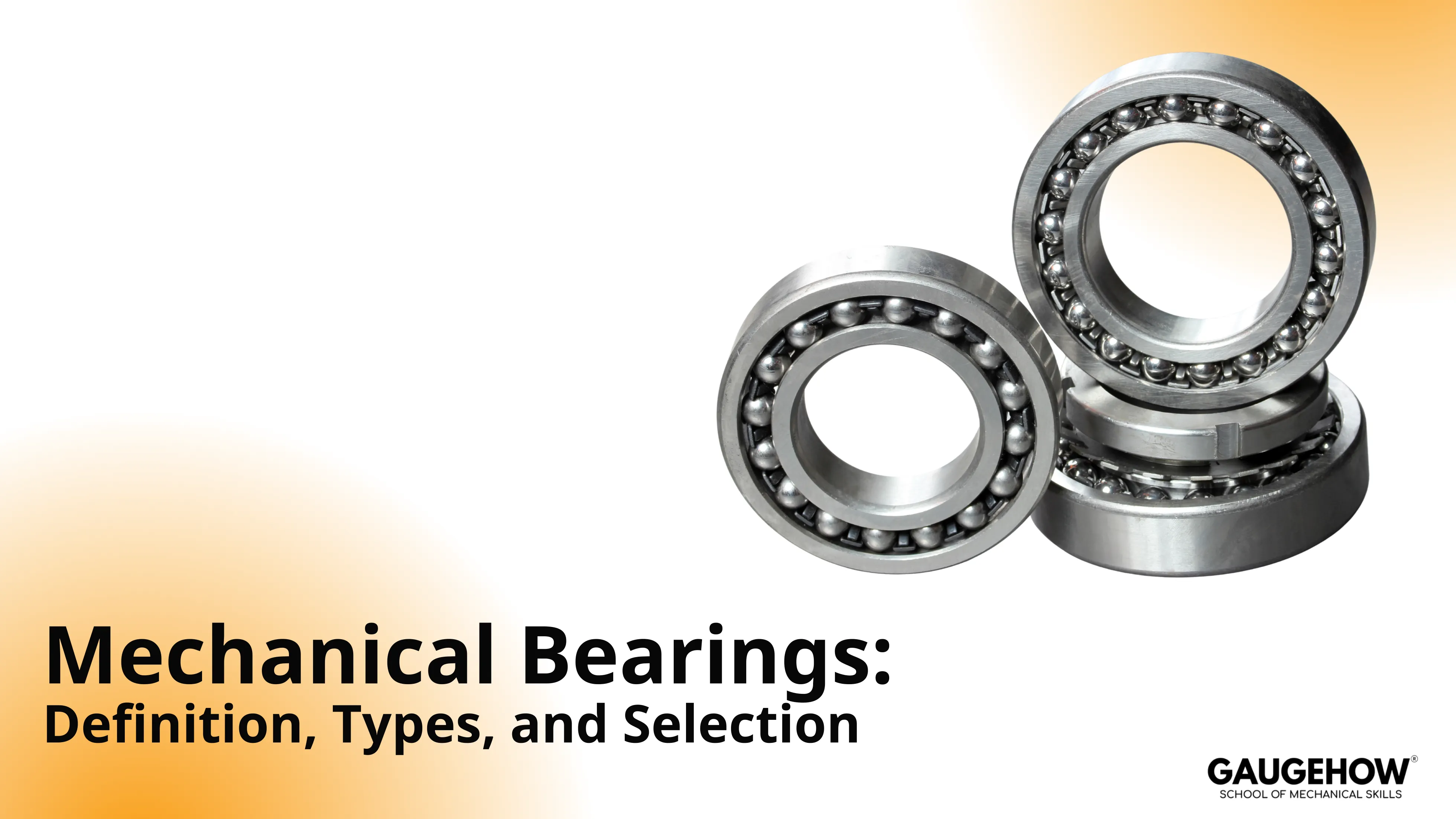 Stacked ball bearings on light background