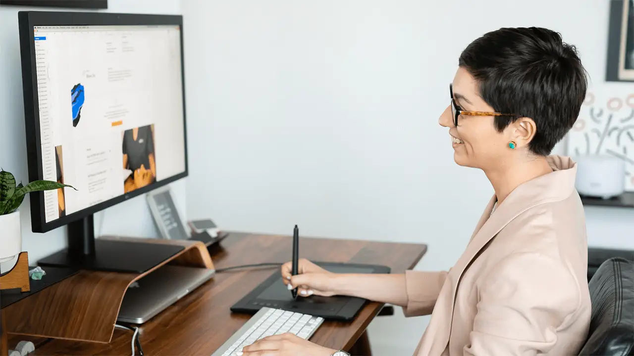 brand designer working on computer