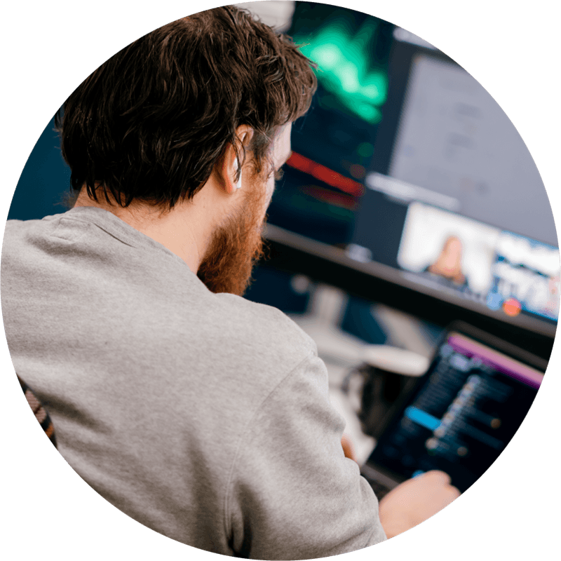 Photo of an Opencast team member working at a computer