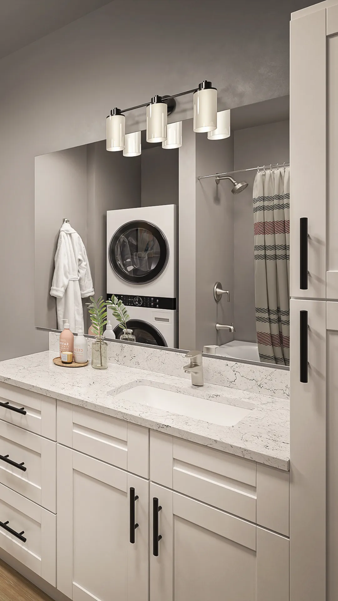 A clean bathroom featuring a sink, mirror, and washing machine, showcasing a tidy and organized space.