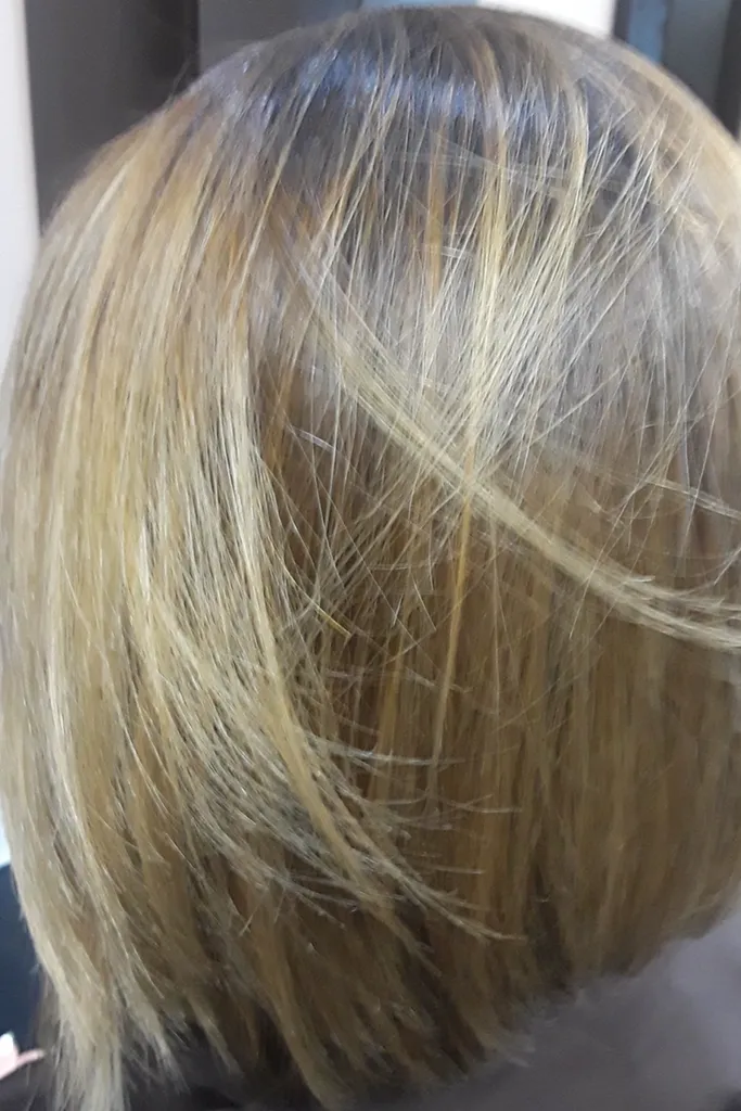 Long blonde hair transformation to cool platinum blonde