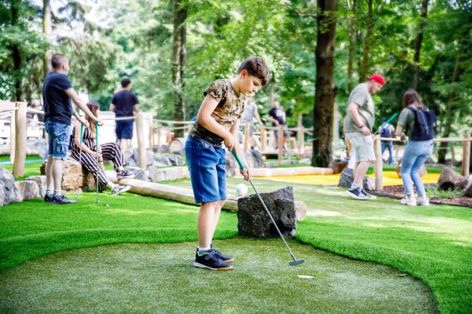 Play putt-putt in the park