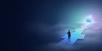 Person standing on path toward light