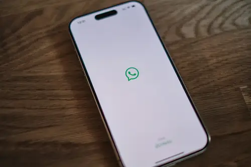 WhatsApp icon on smartphone screen