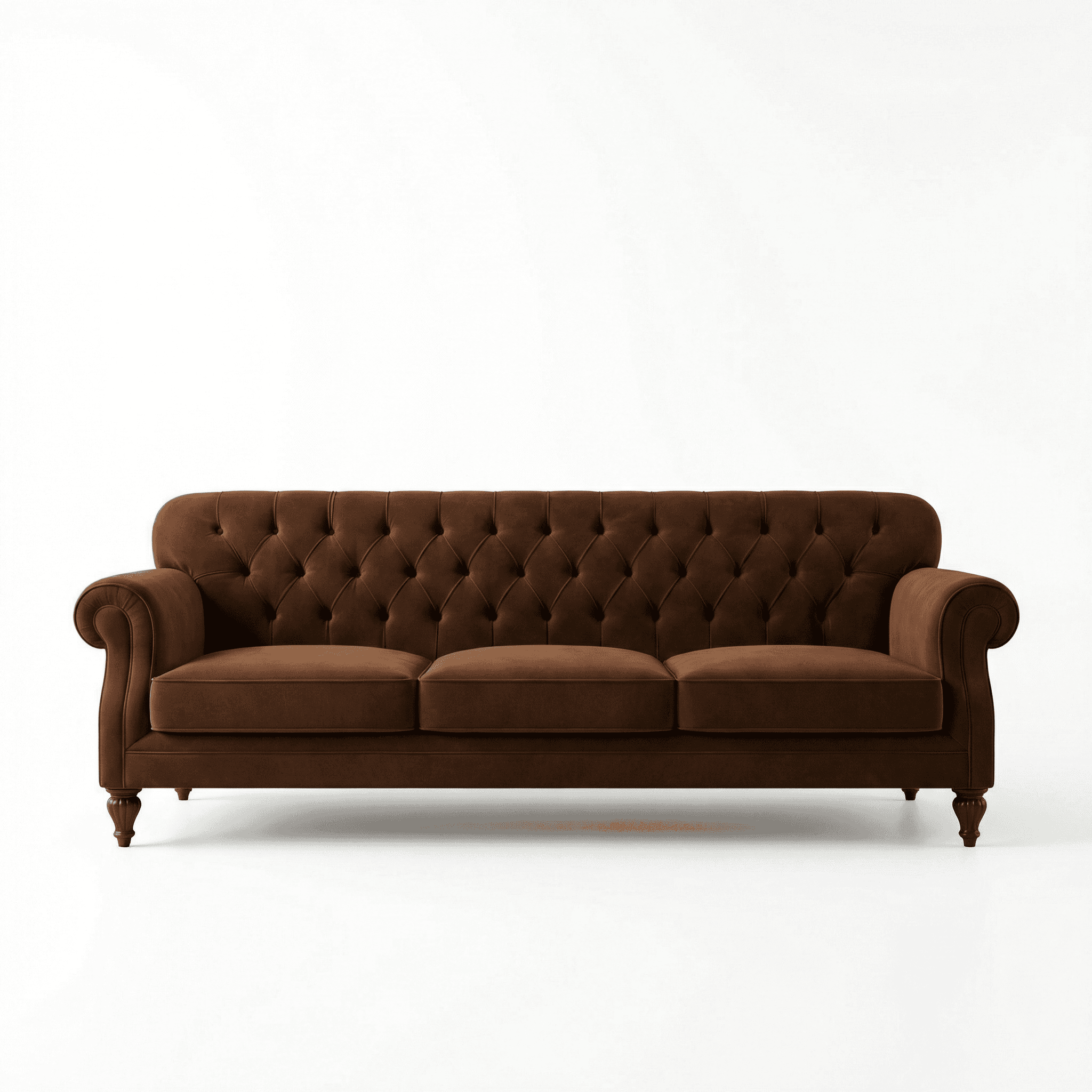 A luxurious three‑seater defined by a richly tufted back and deep, inviting seating.