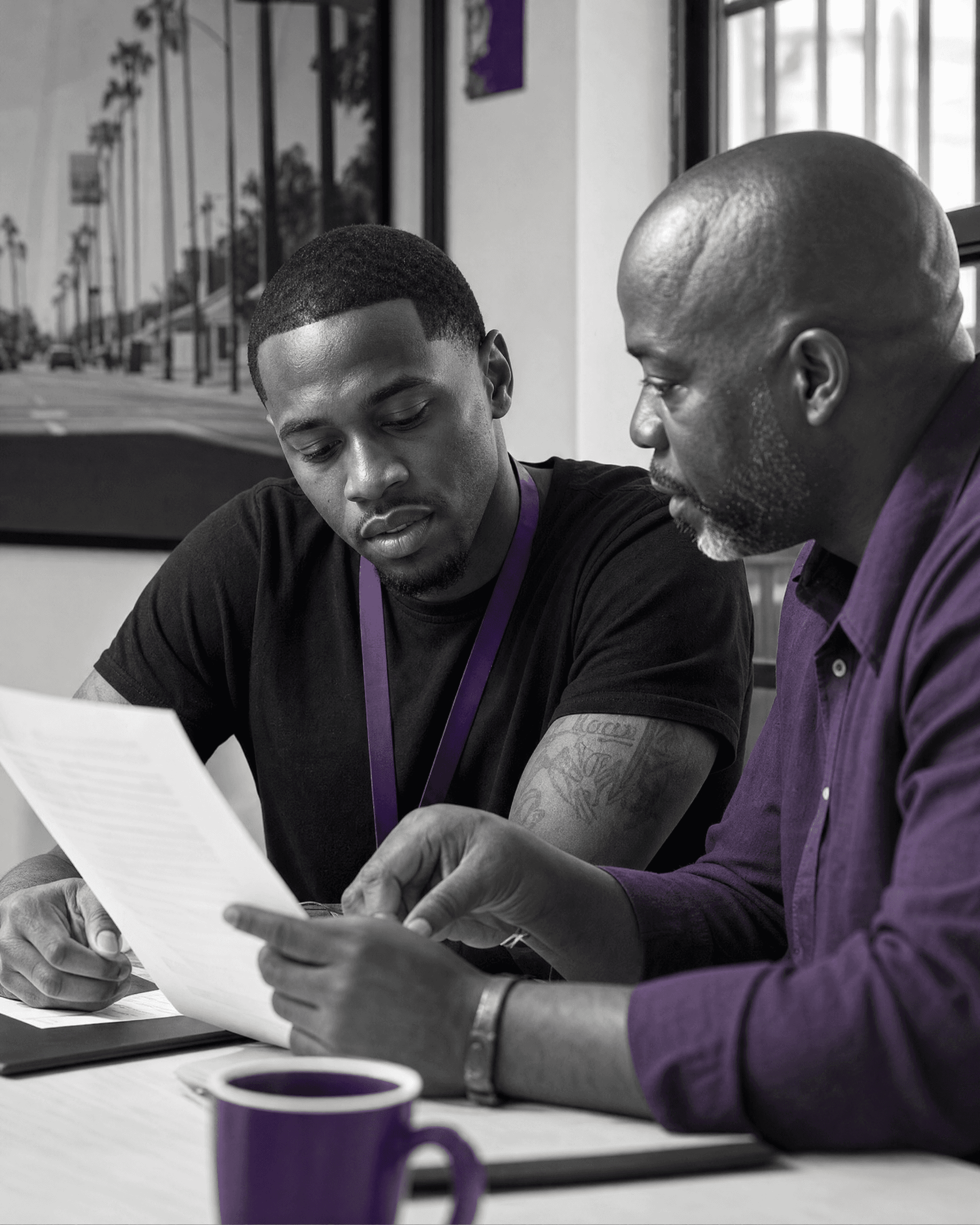 Participant reviewing reentry needs and resources with a mentor.