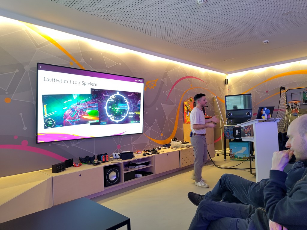 Yoshi Möller giving a talk at CipSoft game studio