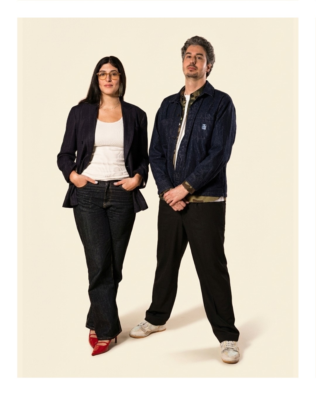 a blurry photo of a person standing in front of a wall