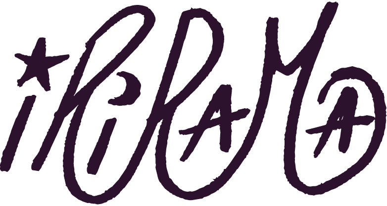 Purple irirama logo, in hand-drawn script, with star and moon dotting the two letter i's