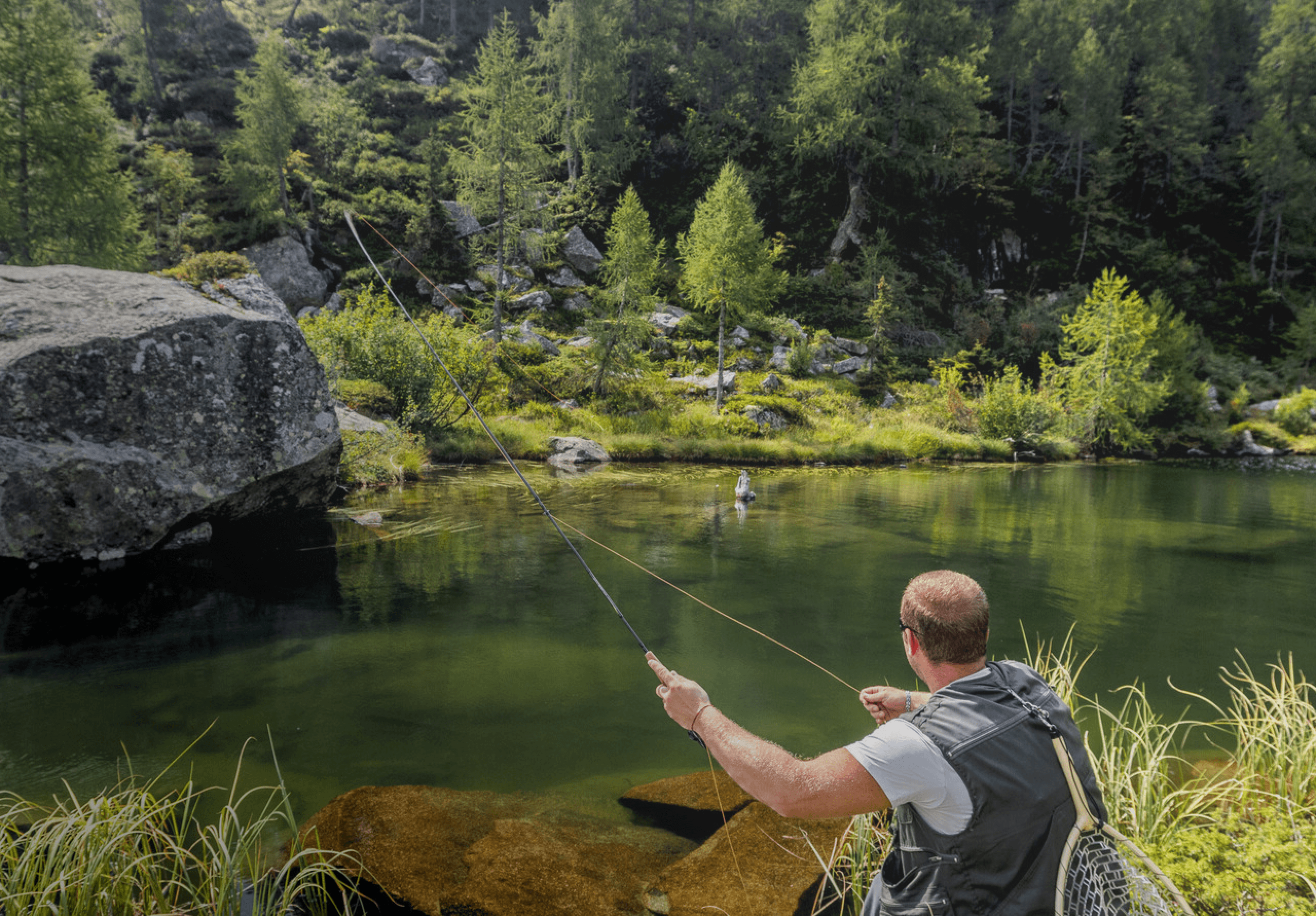 Fly fishing in Italy on a peaceful river in Tuscany or Umbria, featuring a fisherman casting a dry fly for brown trout and wild trout in clear blue waters, surrounded by the scenic countryside. Perfect spot for alpine fishing adventures