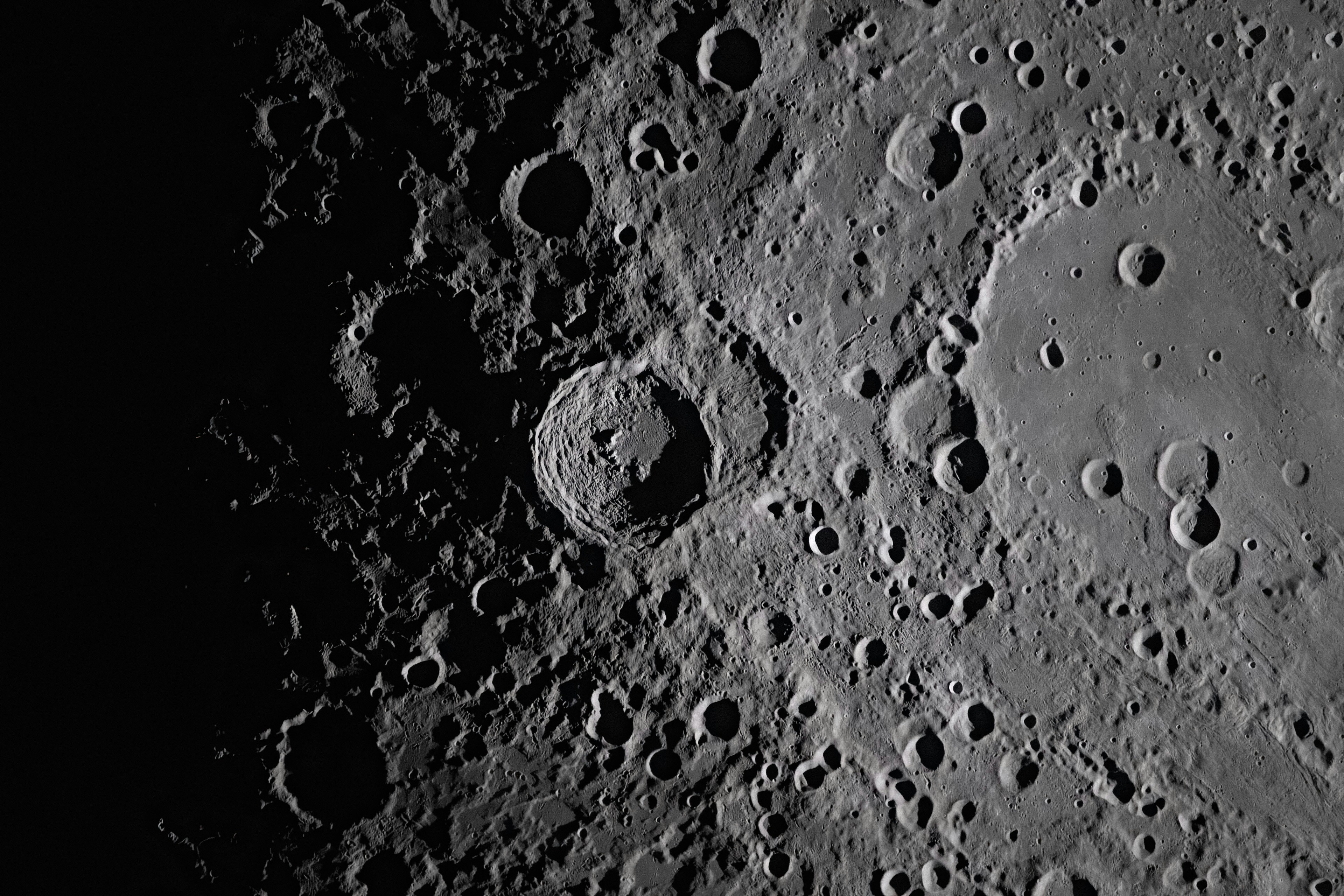 Close-up view of the moon's cratered surface