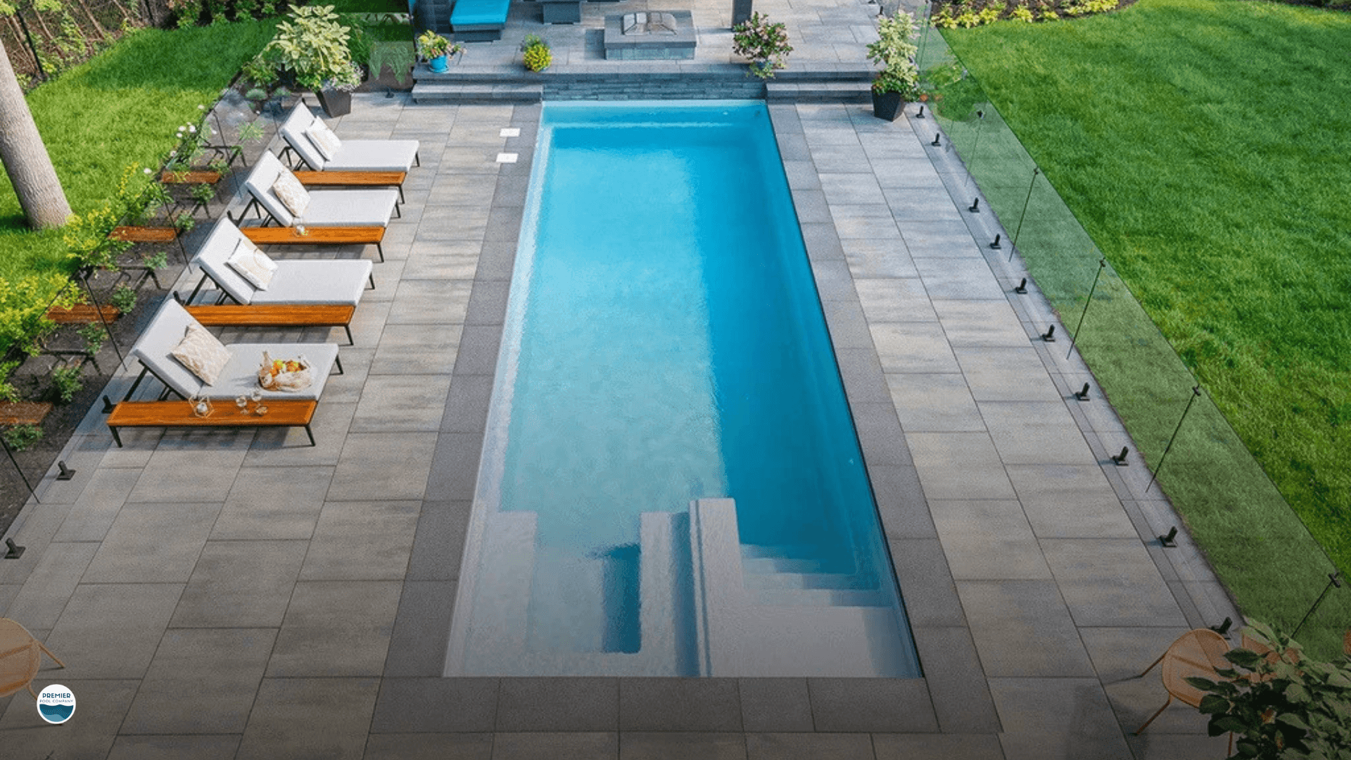 Fiberglass pool in Ohio backyard showing long lifespan through seasonal climate changes