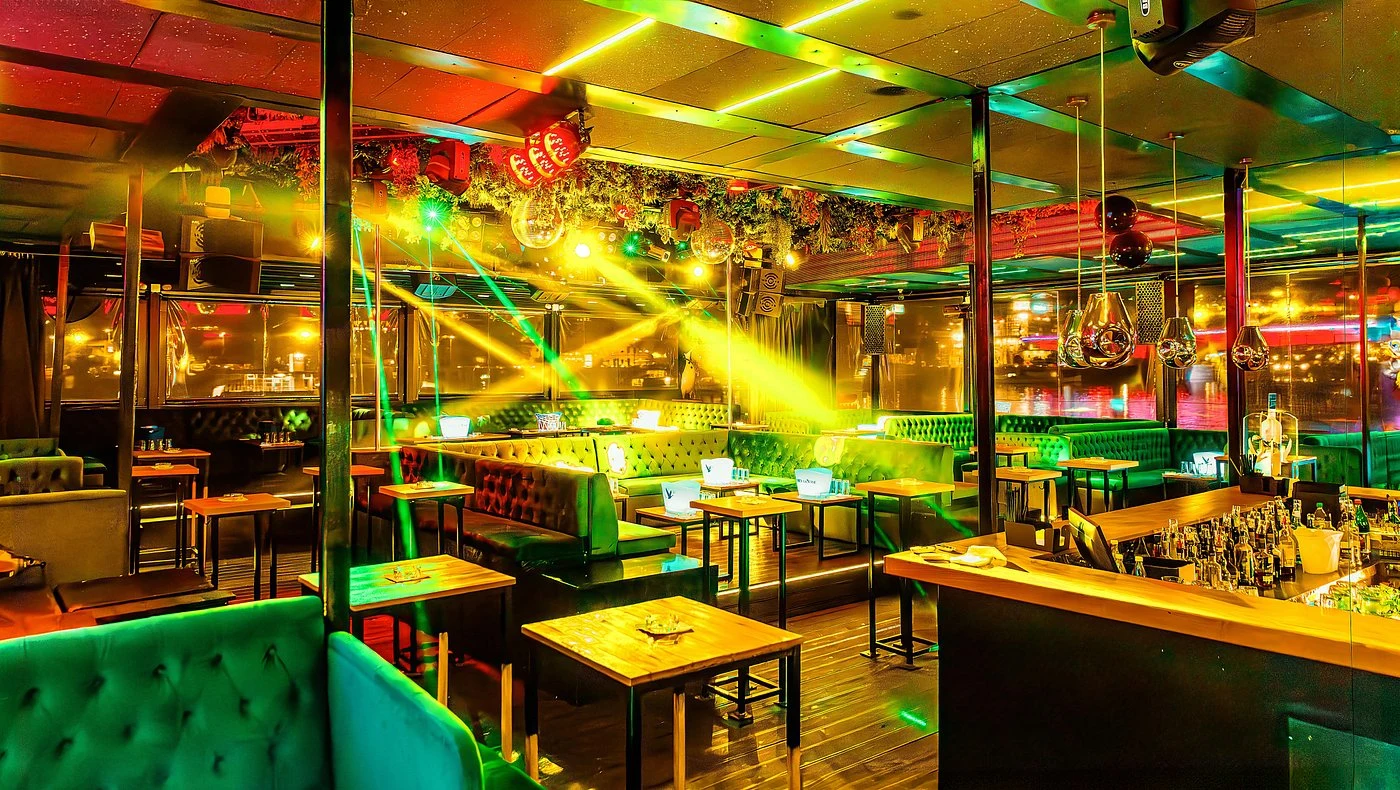 Splav Tag nightclub interior with dance floor and DJ stage, located in Belgrade, Serbia