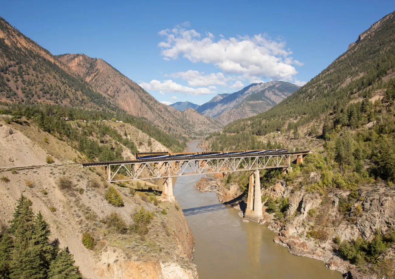 The Rocky Mountaineer train crossing the Fraser River bridge in British Columbia, on the First Passage to the West route