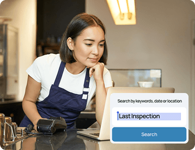 Worker typing into a search bar labelled “Search keyword, date, location,” showing fast document retrieval in a workplace setting.