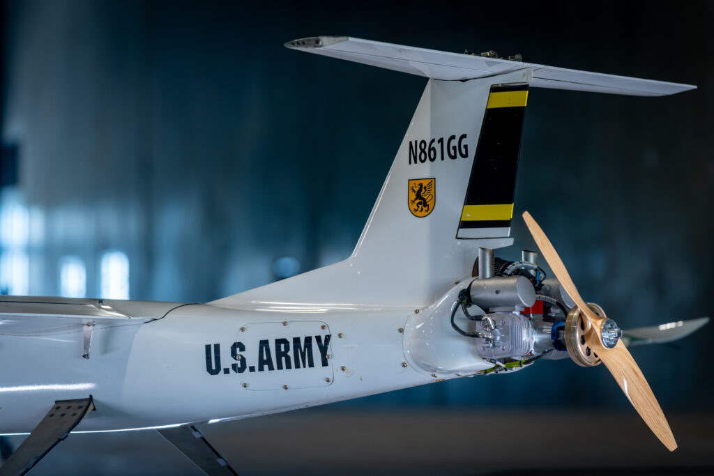 Tail section of a Griffon Aerospace target drone with U.S. Army markings and a rear-mounted propeller