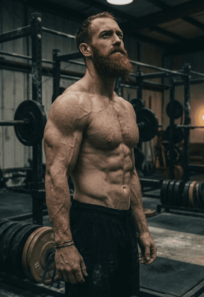 man wearing green crew-neck t-shirt looking upwards