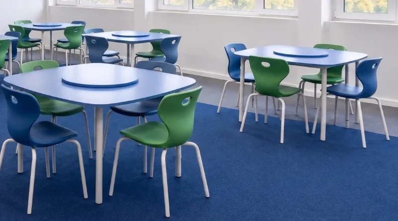 Colorful school chairs in a modern classroom for education projects
