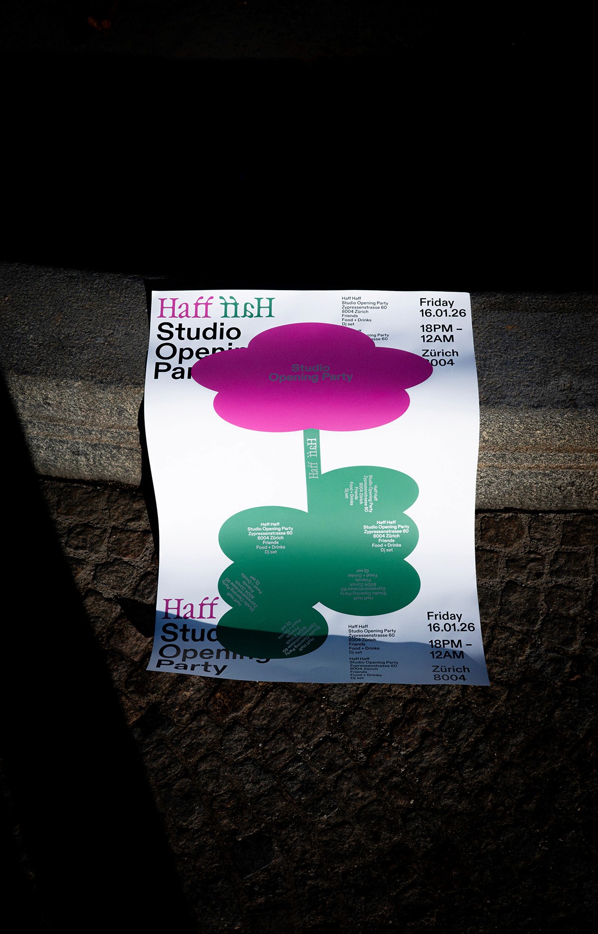 A high-contrast flat lay of the "Studio Opening Party" poster on a stone surface, featuring a large, stylized pink flower on a green stem. The clean Swiss typography and playful graphic language reflect the studio's dual nature of professional precision and creative play.