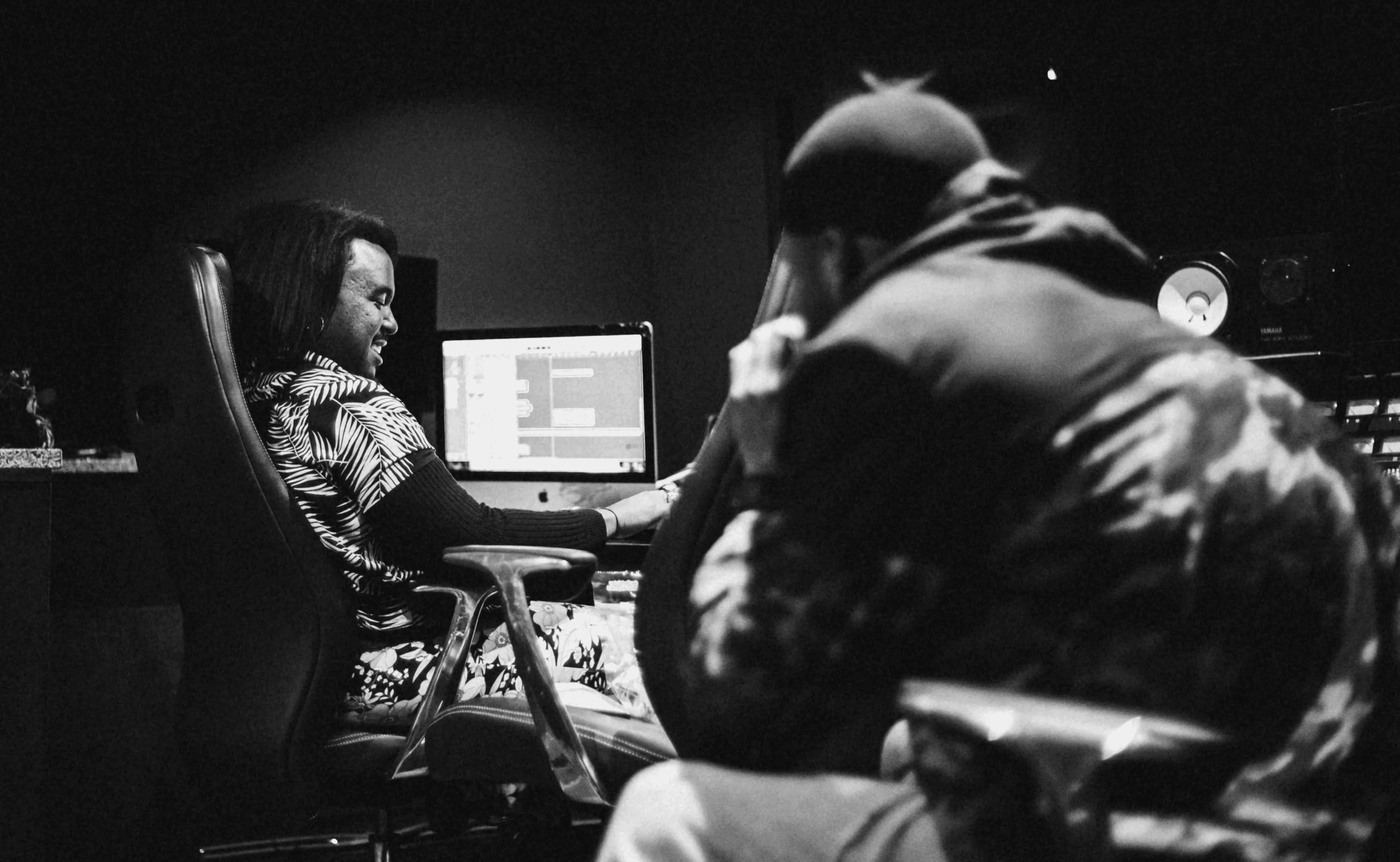Music producers in a studio working together. Photo by Frankie Cordoba on Unsplash