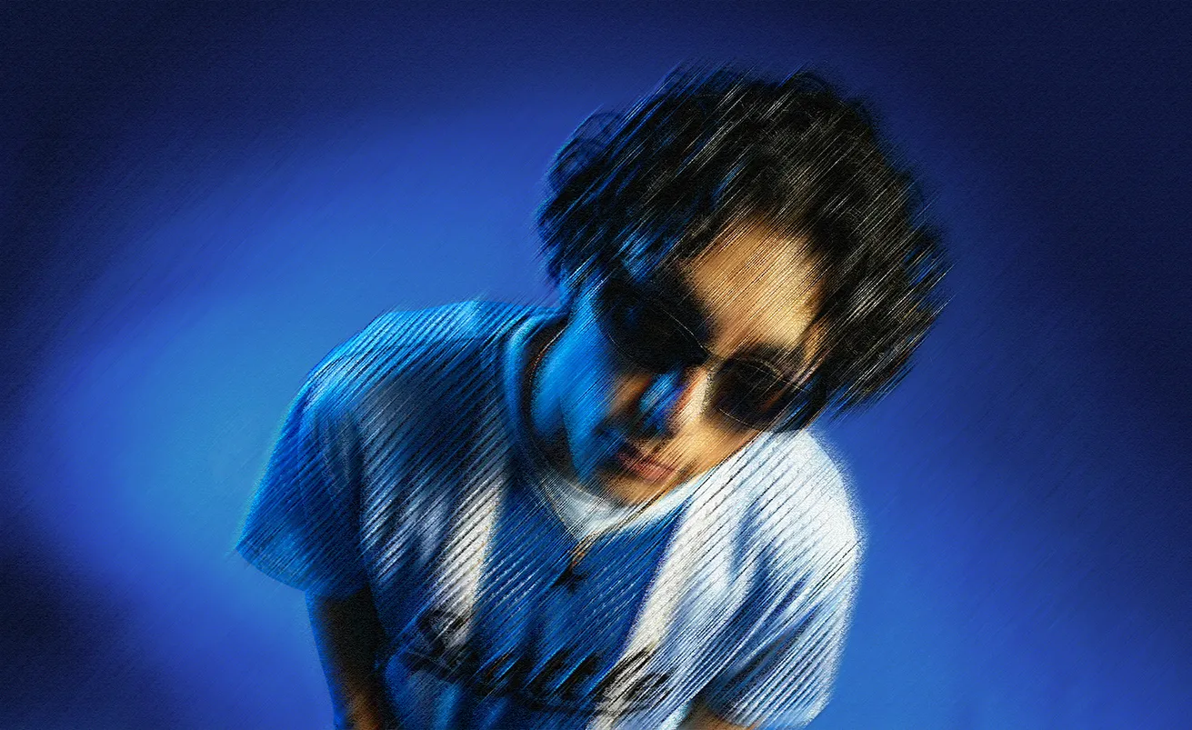 Nathan qui porte des lunettes de soleil