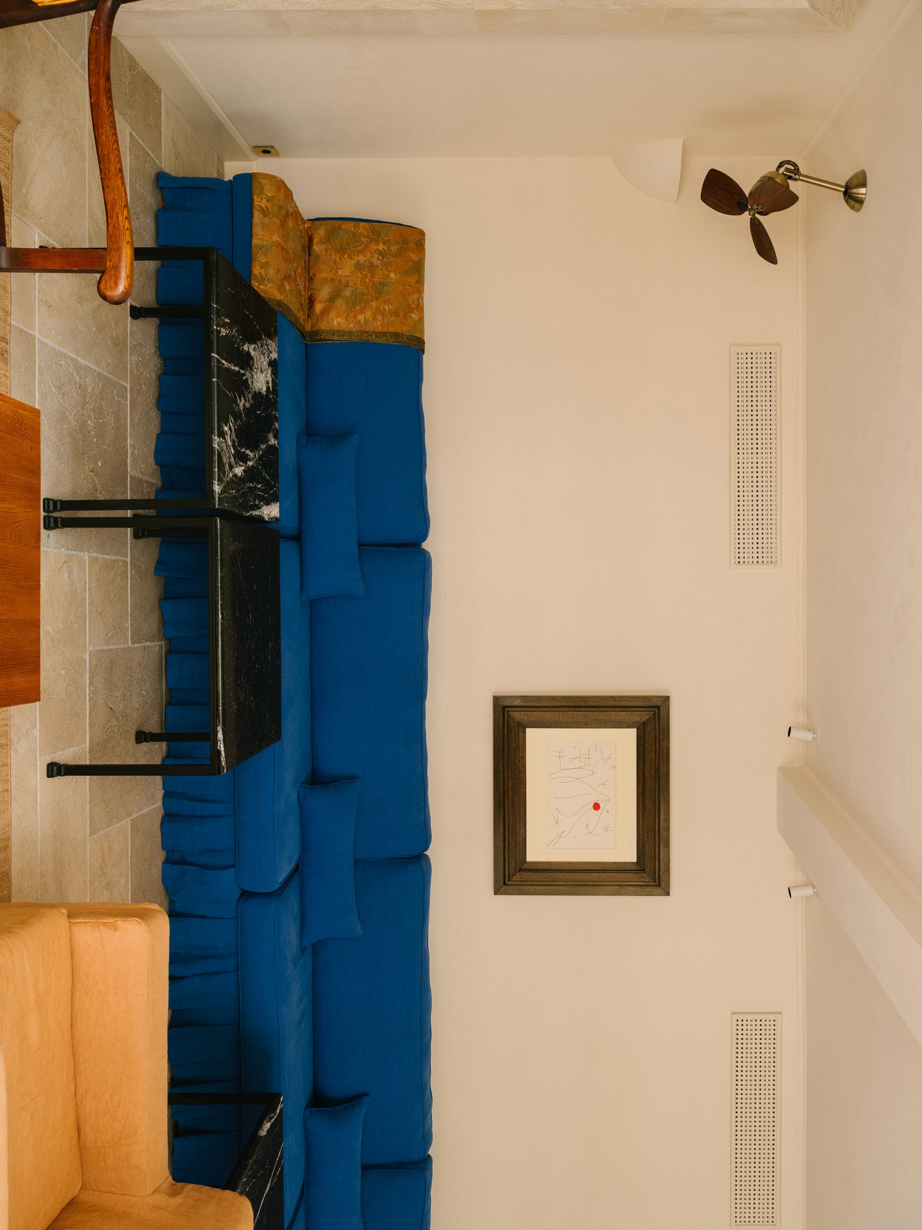 Streetside billboard with flyposters of the Batch.Works brand and illustrations