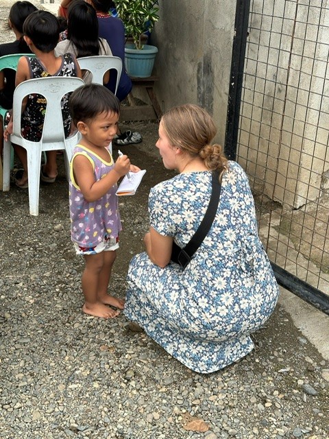 Women talking to child