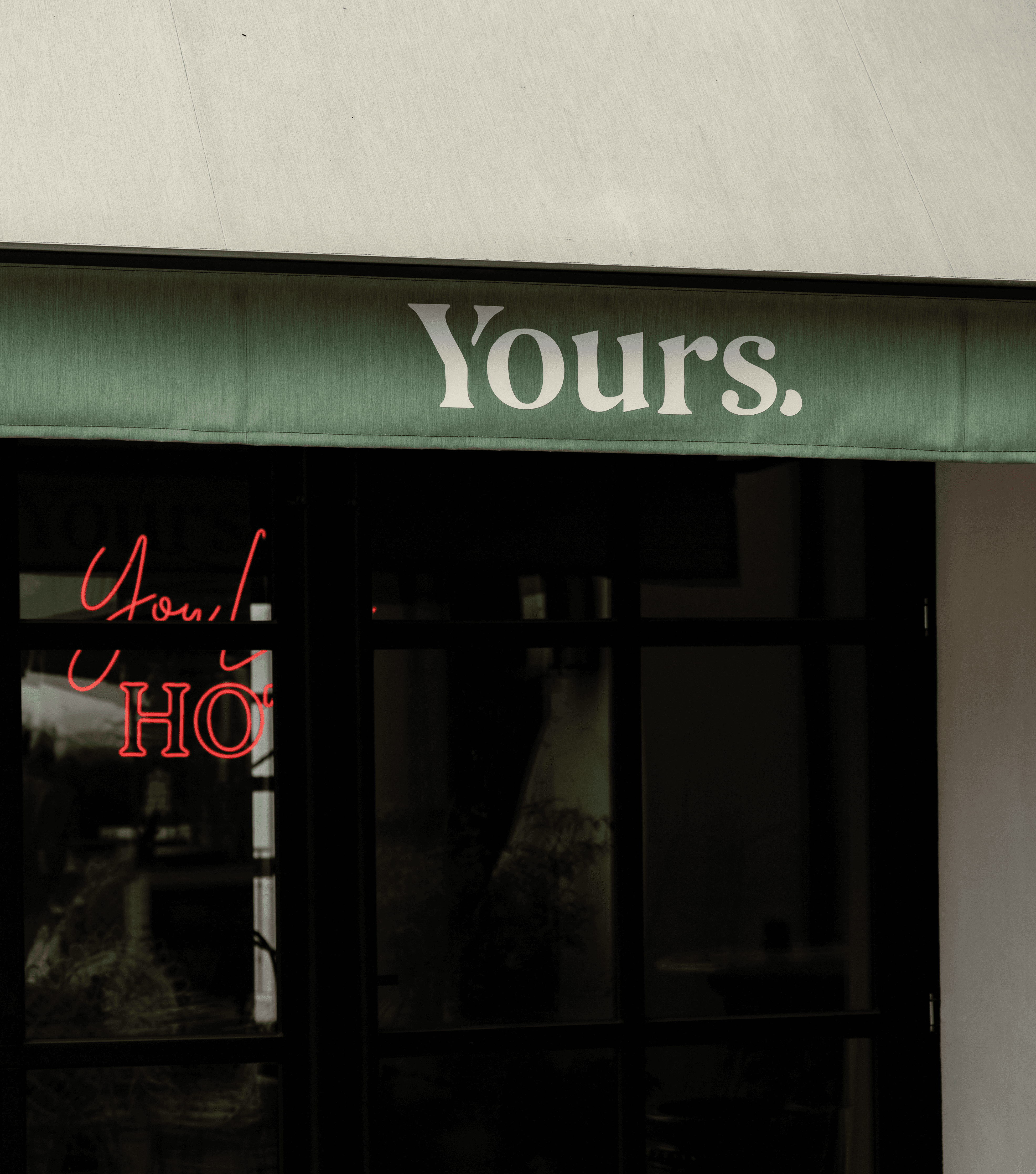 A neon sign that says "You look HOT."