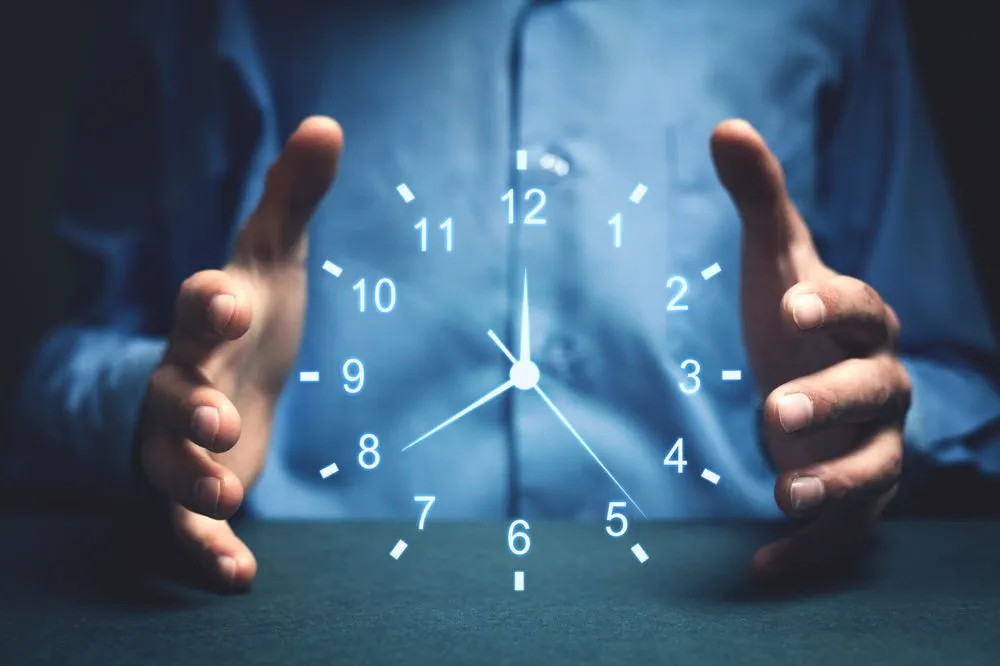 Hands holding holographic clock