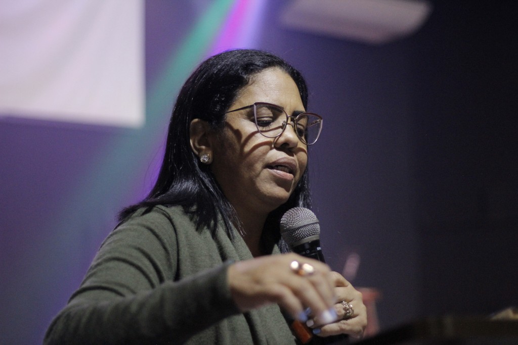 body of water under cloudy sky