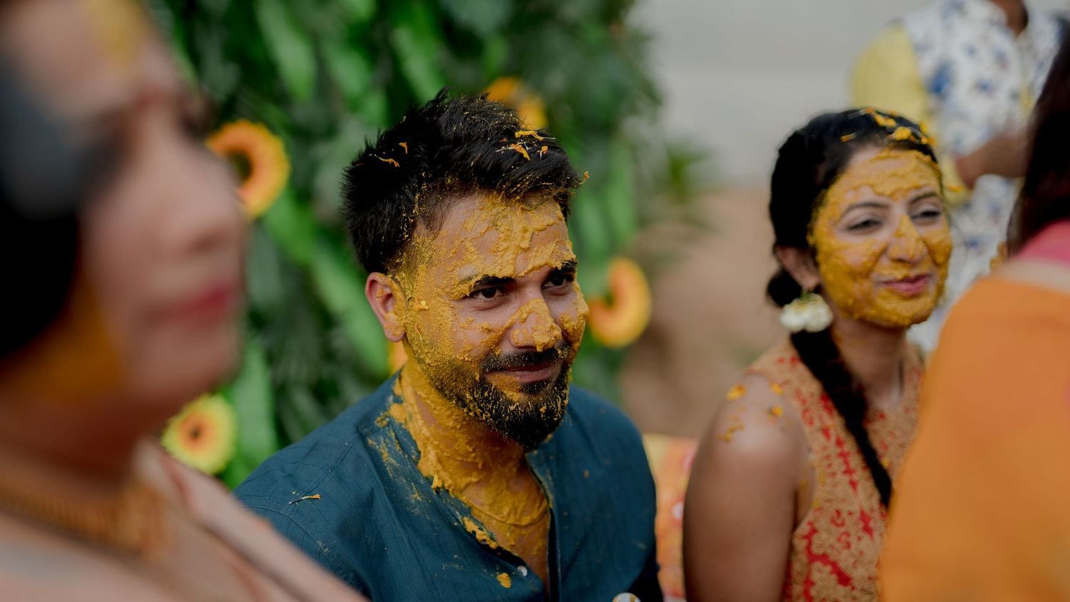groom haldi ceremony portrait turmeric face candid wedding photography India