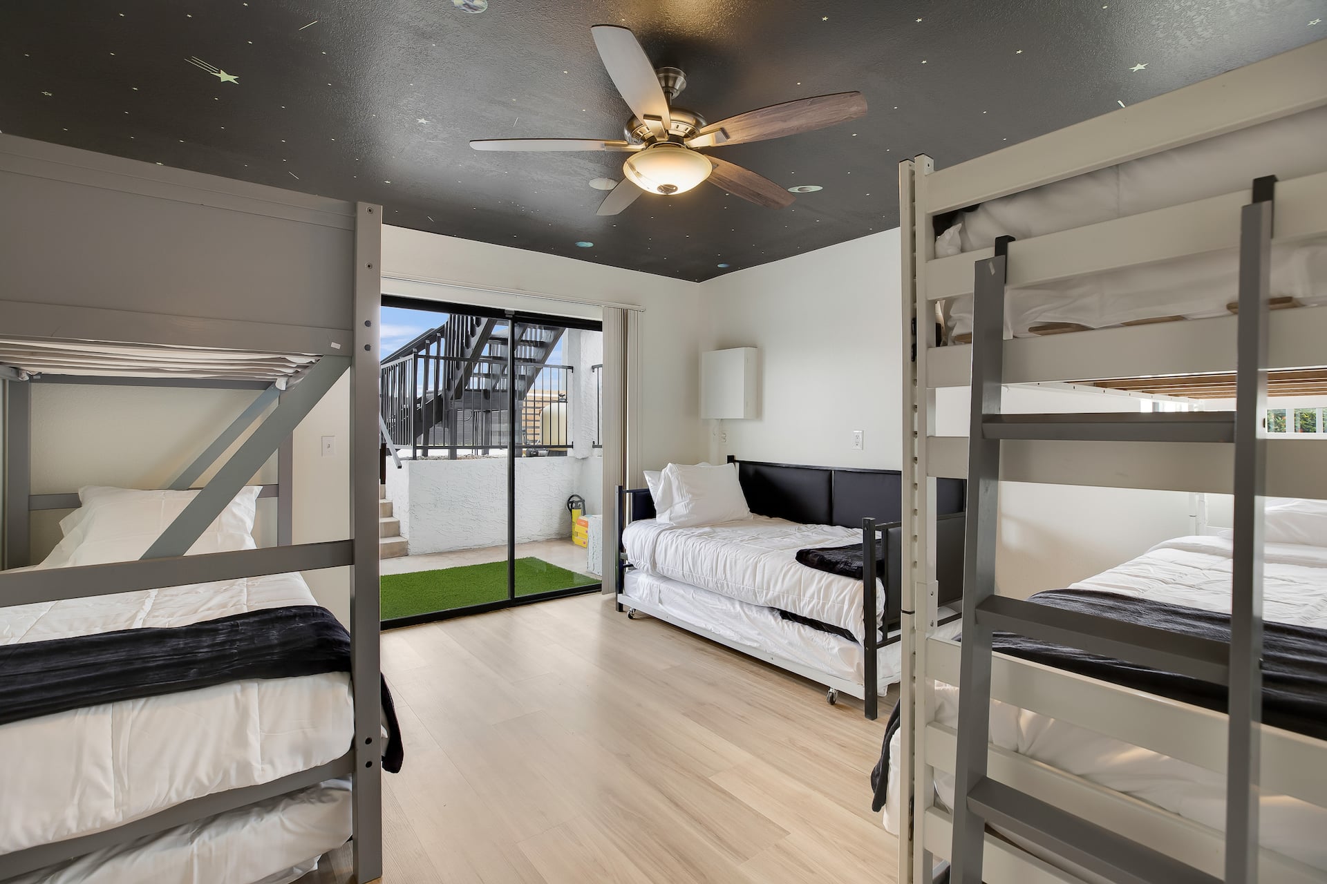 Bunk room with twin beds and trundles