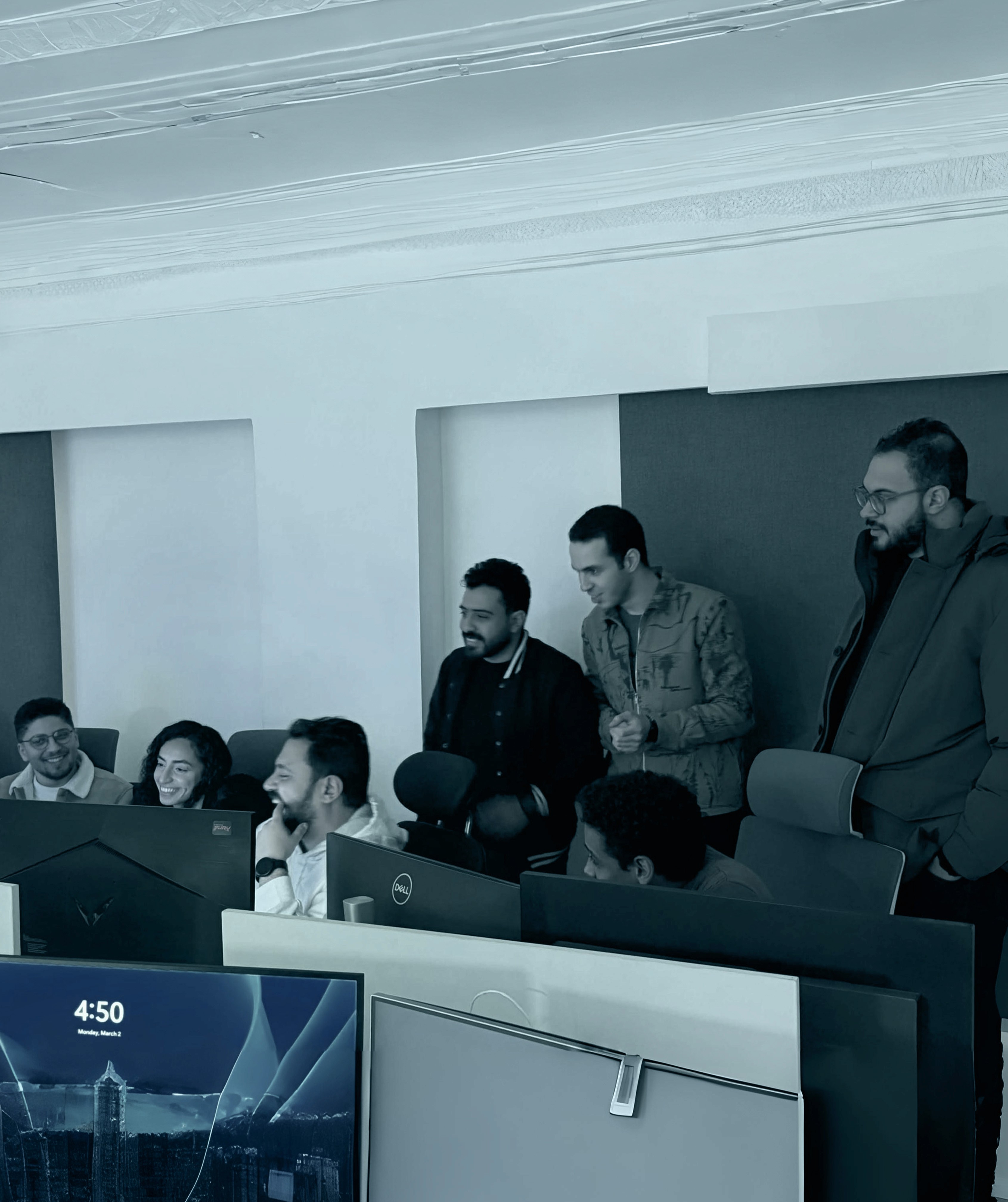 Interior of a cafe or workspace with several people at tables