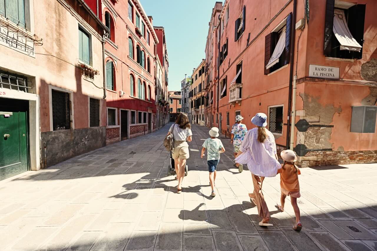 Family trip holiday leisure city heat urban tourist festival cafe terrace heatstroke overheating finding shade cooling down